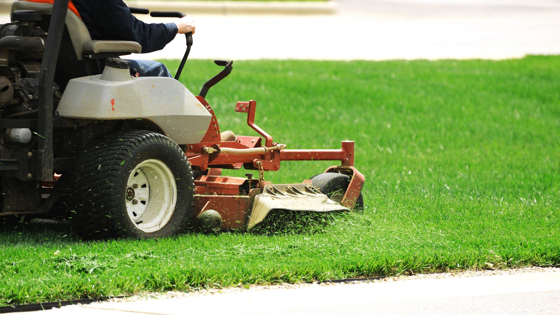 Professional mowing green yard in North Mankato, MN.