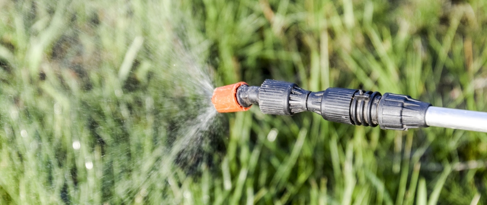 Liquid fertilizer being applied to lawn in North Mankato, MN.