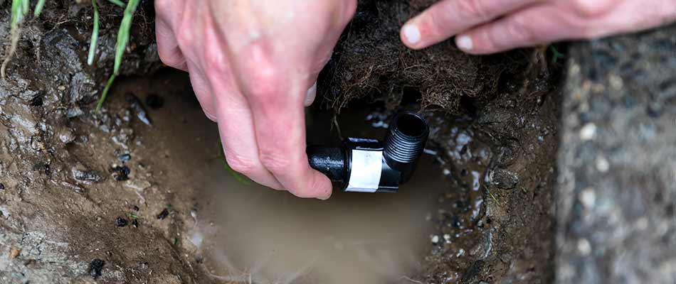 Repairing and replacing an irrigation line at a home in North Mankato, MN.